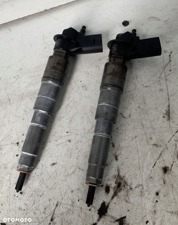 WTRYSKIWACZ PIEZOELEKTRYCZNY 7796042 BMW E60 E61 - 2