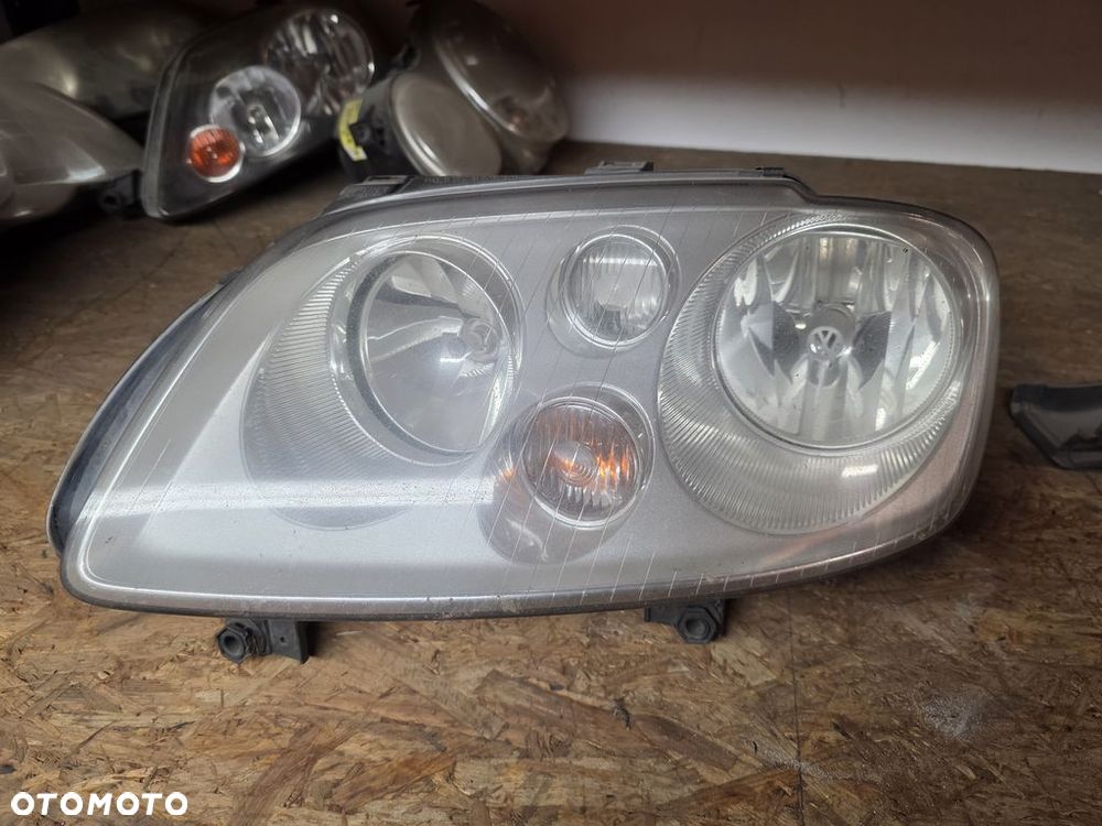 VOLKSWAGEN TOURAN I LAMPA PRZEDNIA LEWA ANGLIK 1T0941005 - 1
