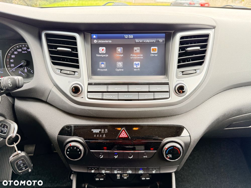 Hyundai Tucson blue 1.6 GDi 2WD Navi - 20