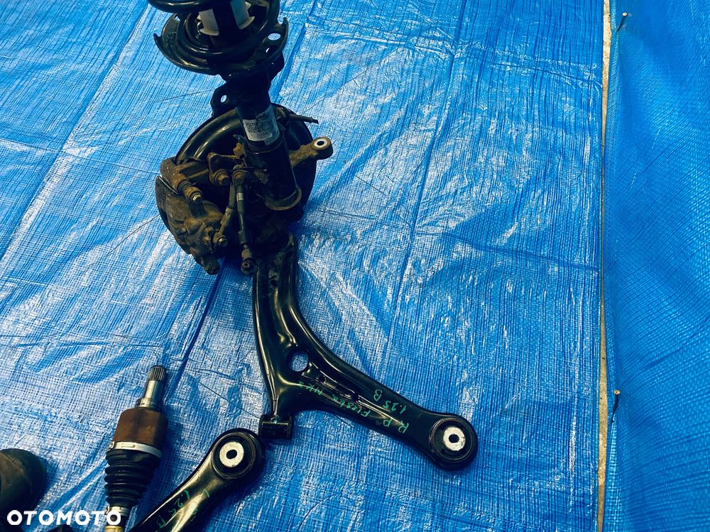 MCPHERSON ZAWIESZENIE ZWROTNICA LEWA PRAWA KOPYTO AMORTYZATOR WAHACZ PÓŁ OŚ PIASTA TARCZA ZACISK KOMPLET LEWY PRAWY PRZÓD PRZEDNIE FORD FIESTA MK7 VII LIFT 1.25BENZYNA 16R ORYGINAŁ - 8