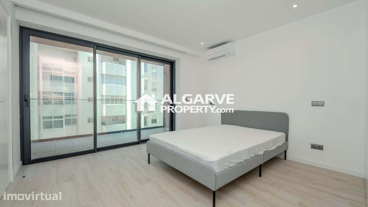 Moderno apartamento T2 com vista mar a 150 metros da Praia de Quarteir - Grande imagem: 4/25