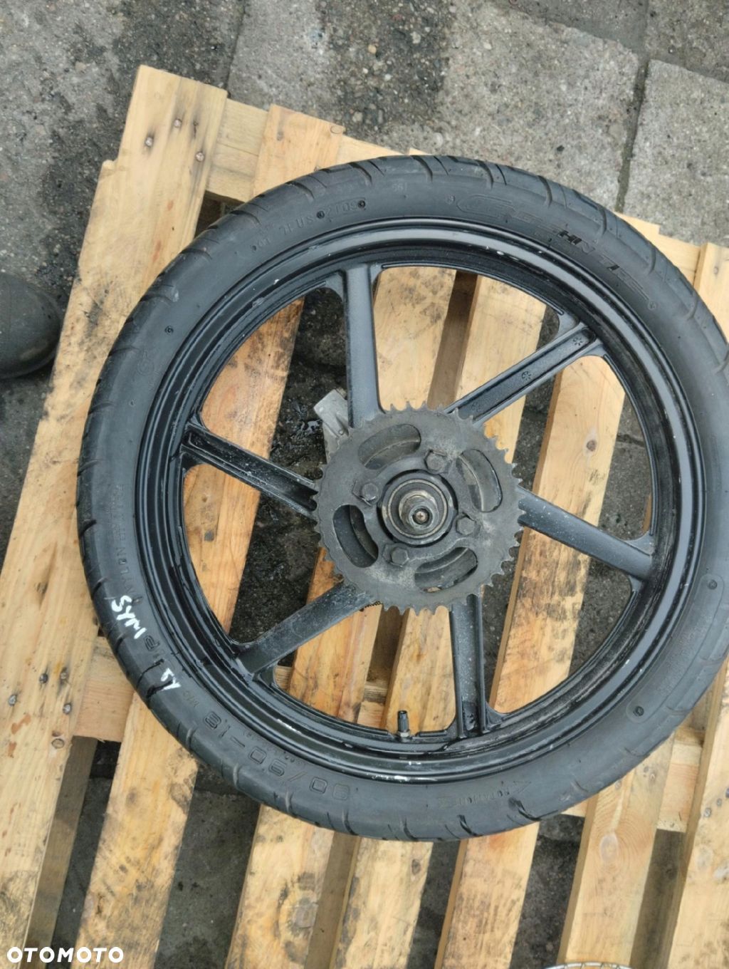 KOŁO FELGA TYL SYM XS125-K 90/90/18 - 1