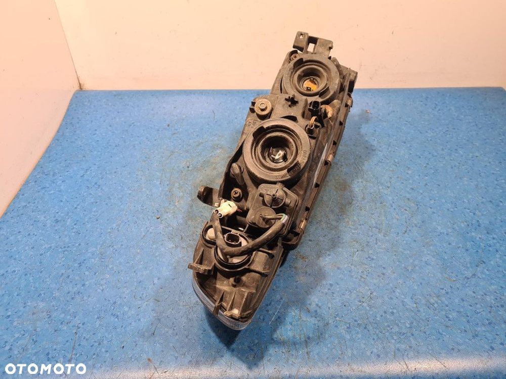 MITSUBISHI GALANT VIII LIFT REFLEKTOR LEWY - 12