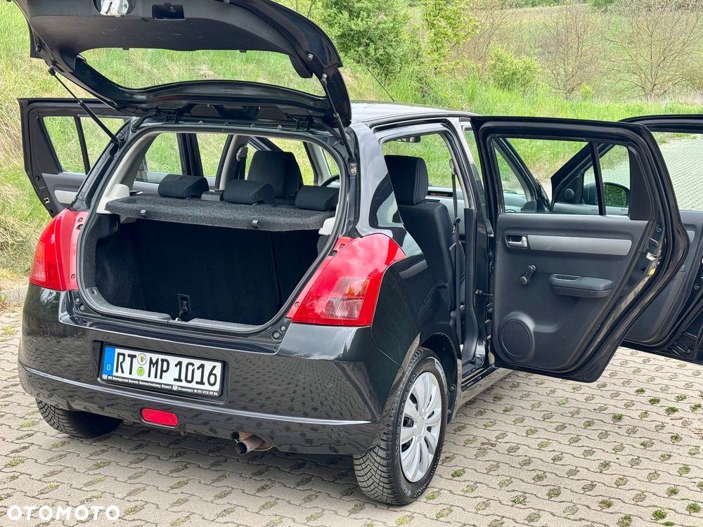 Suzuki Swift 1.3 Comfort+ - 31