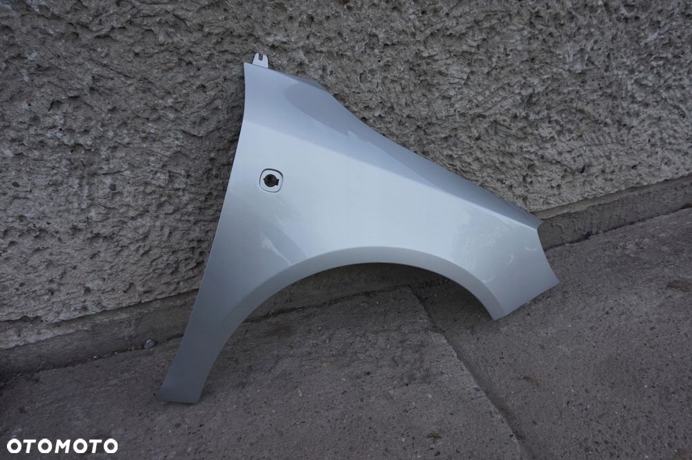 BŁOTNIK PRAWY SKODA FABIA II 2 ROOMSTER 9102 - 4