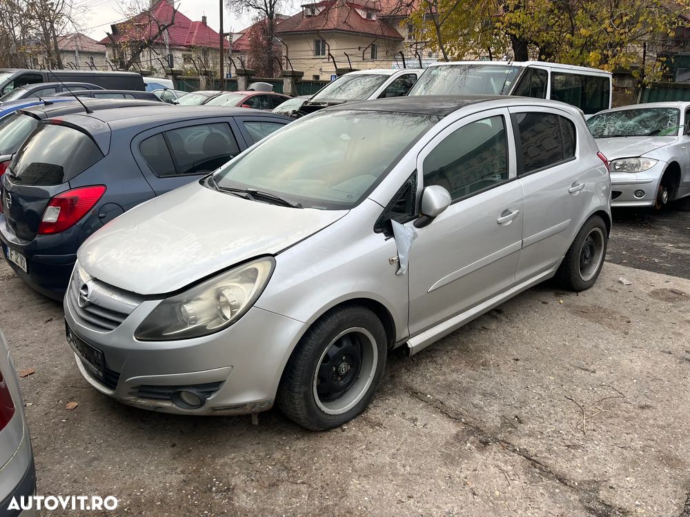 Dezmembrez Opel Corsa D 1,3 cdti 2008 gri argintiu 4 usi - 1