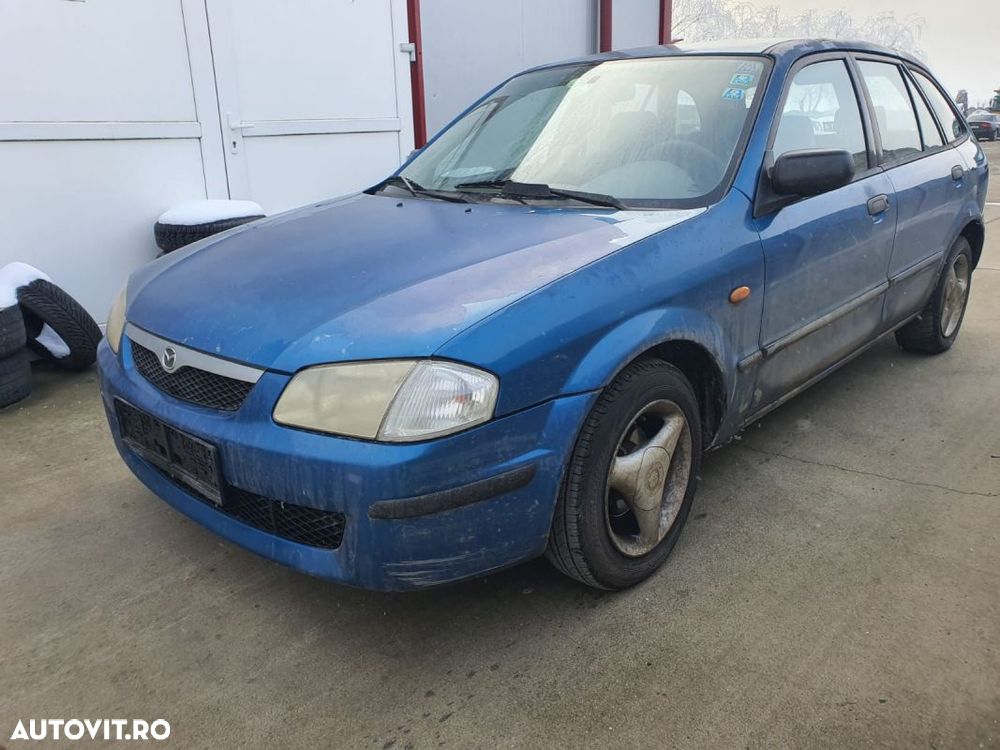 FAR MAZDA 323 S. - 1