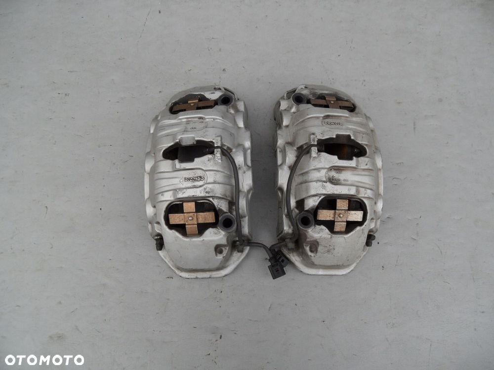 ZACISK HAMULCOWY PRAWY LEWY PRZÓD PORSCHE CAYENNE CAYMAN PANAMERA - 1