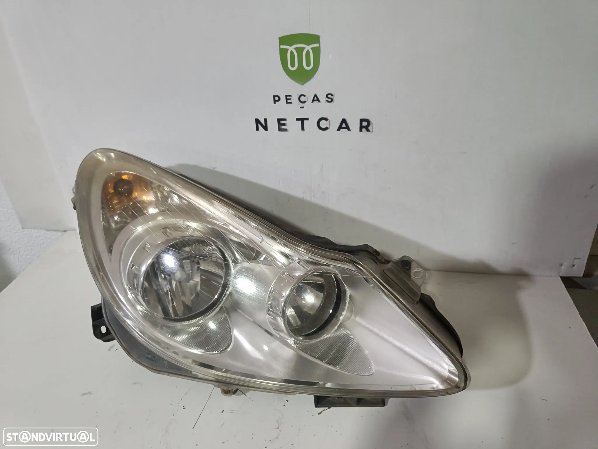 Farol óptica Opel corsa D 2008 - 1
