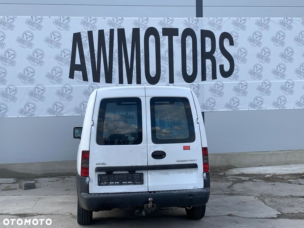 OPEL COMBO 2006 *SAMOCHÓD NA CZĘŚCI* 2805 MASKA, LAMPA, DRZWI, LUSTERKO, ZDERZAK, GRILL, BŁOTNIK, KLAPA, BELKA, DESKA, FOTELE, KANAPA, ĆWIARTKA, KIEROWNICA, TARCZE, ZACISKI, ZAWIESZENIE, KOMPLETNY PRZÓD, KOMPLETNY TYŁ, LICZNIK, ZEGARY, PRAWE LEWE PRZÓD TYŁ - 4