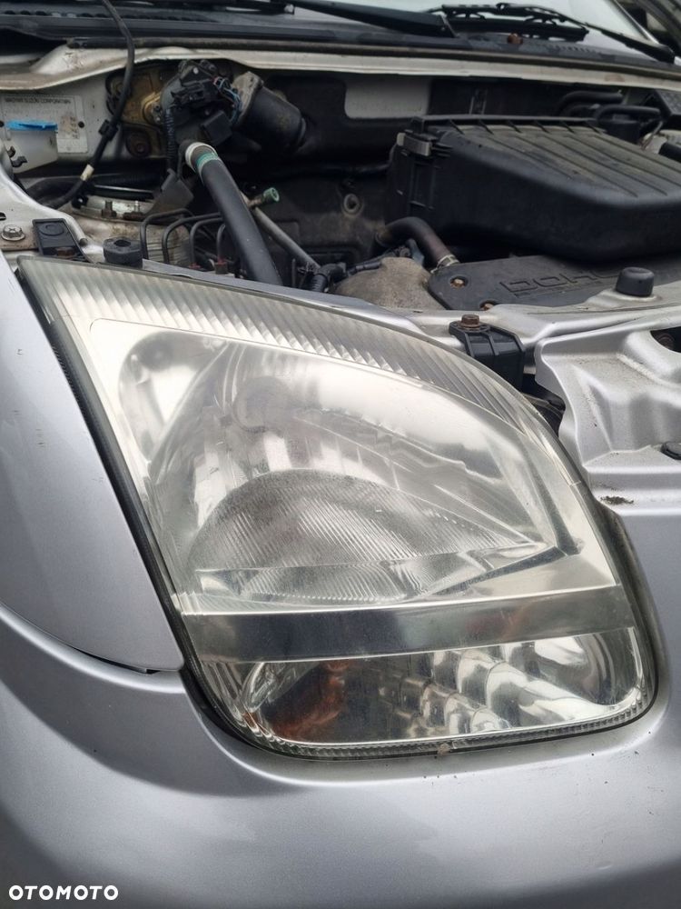 SUBARU JUSTY III G3X 04-07 r. LAMPA PRAWY PRZÓD PRAWA PRZEDNIA PP EU + - 2