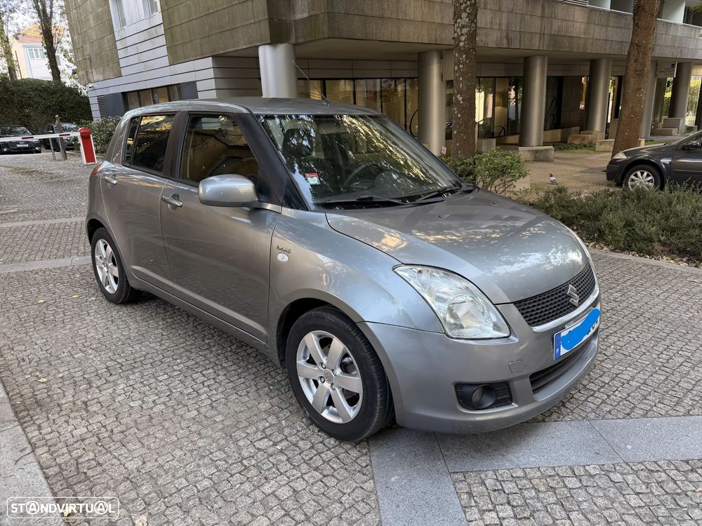 Suzuki Swift 1.3 DDiS Quiksilver - 7