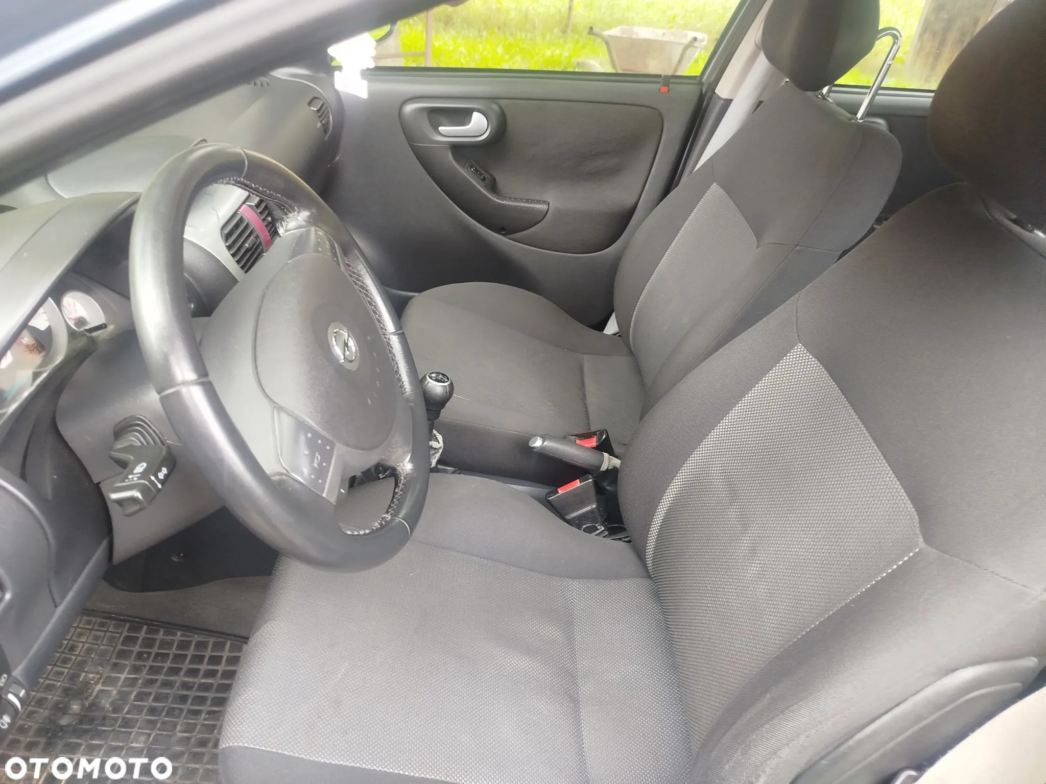 Opel Corsa 1.2 16V Enjoy - 9