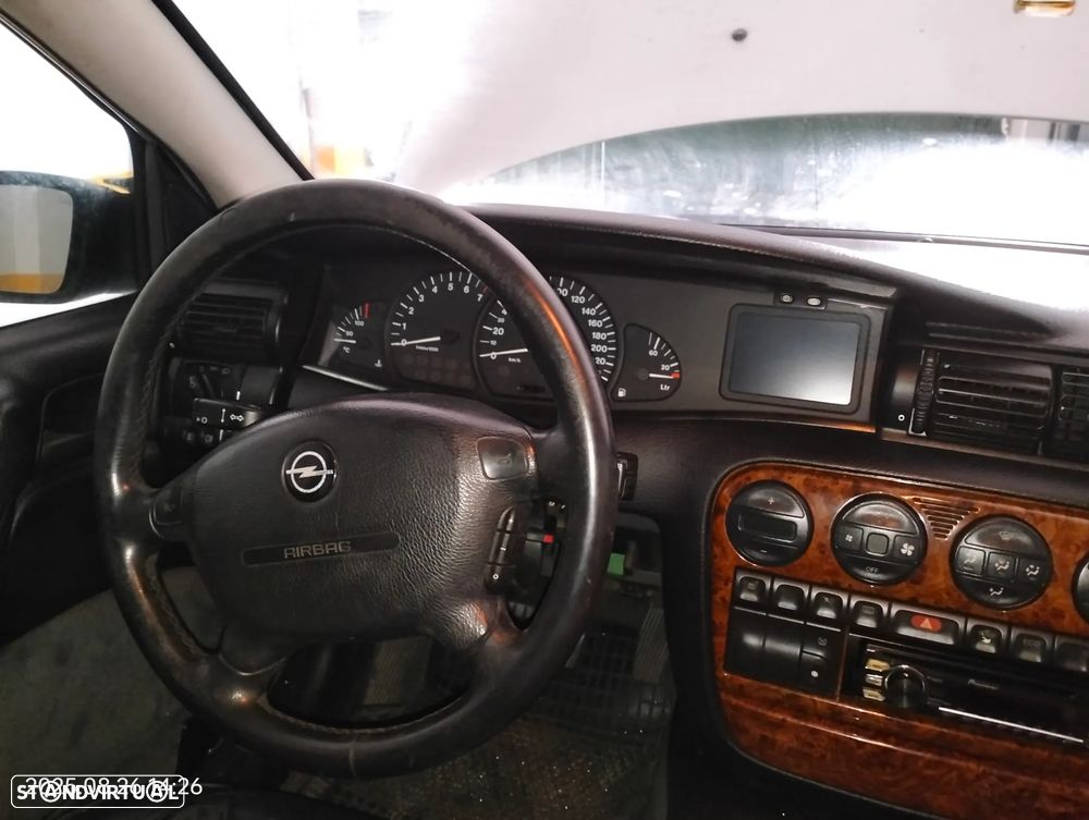 Opel Omega Caravan 2.5i V6 CD - 9