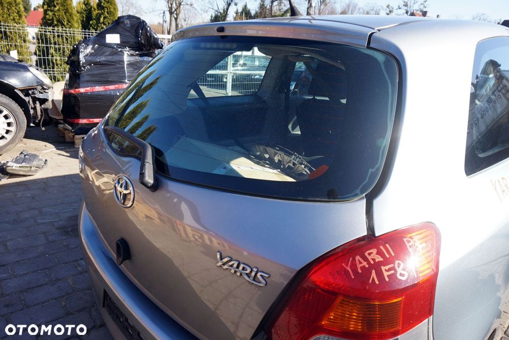 KLAPA BAGAŻNIKA TYLNA YARIS II 3D HB 1F8  SZARY TOYOTA 2005-2009 - 3