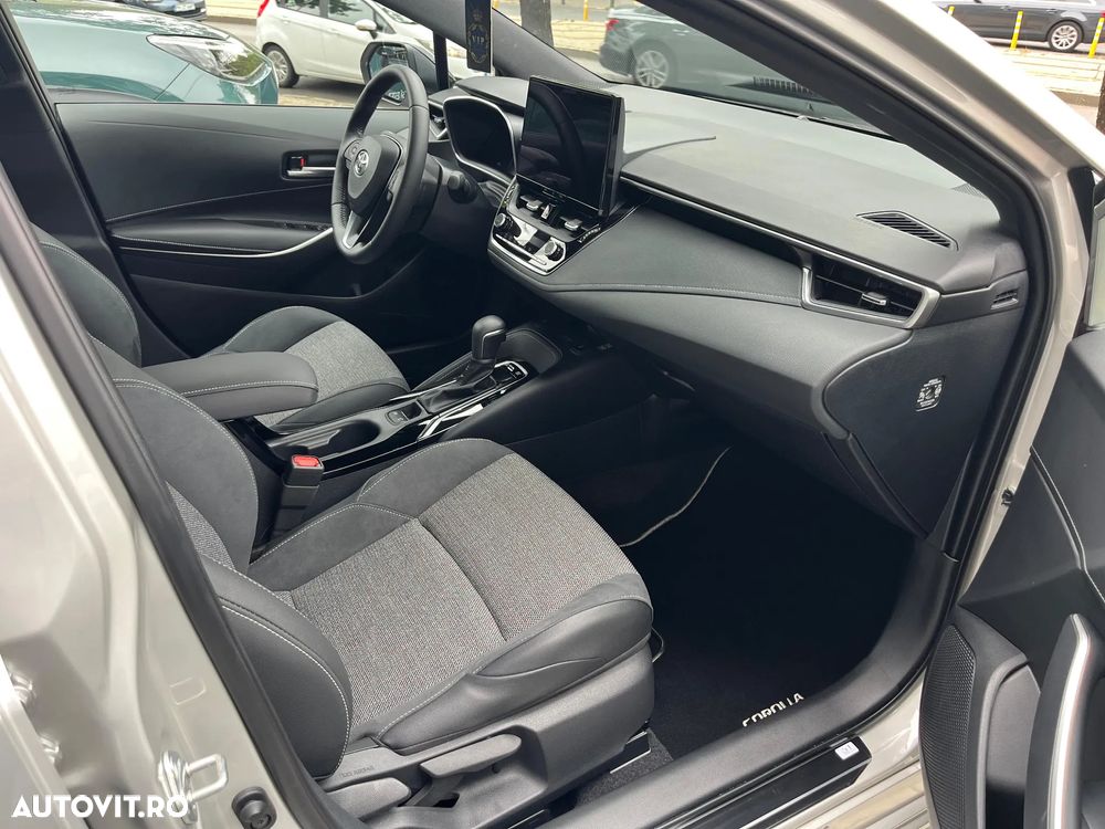 Toyota Corolla TS 1.8 HSD Dynamic - 29