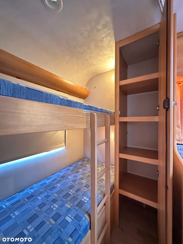 Adria ADORA 542 TK z przedsionkiem Isabella i łóżkami piętrowymi. - 12