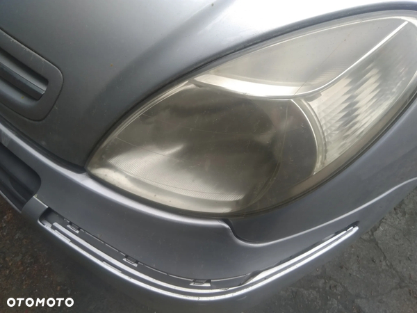 Citroen Xsara Picasso lampa przednia lewa