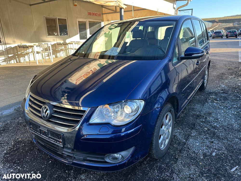 Volkswagen Touran 1.4 TSI DSG Conceptline - 1