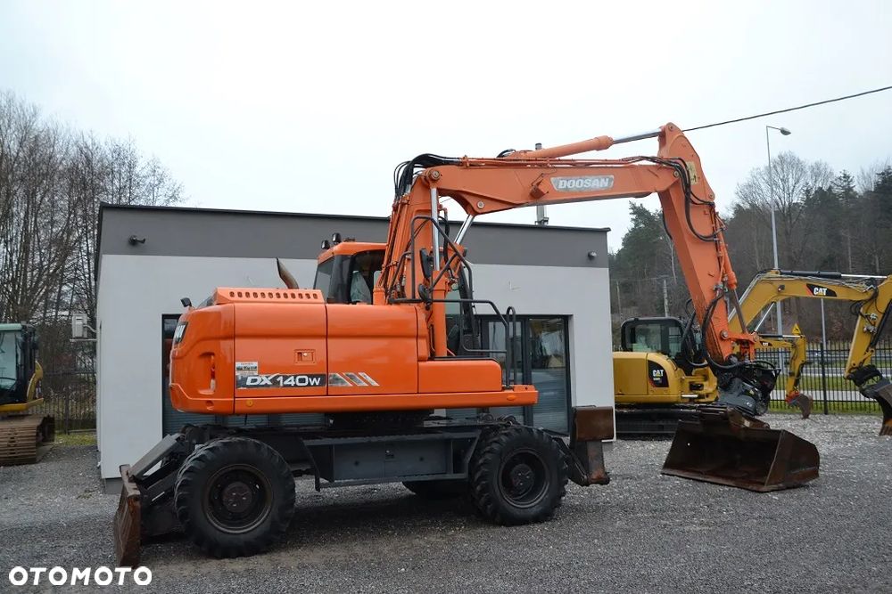 Doosan DX 140 W - 11