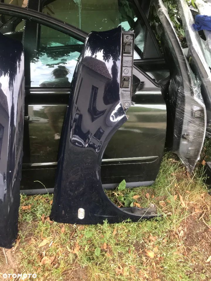 BŁOTNIK PRAWY GOLF IV 1J0807183A - 1