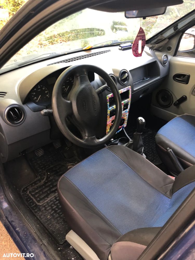 Dezmembrez Dacia Logan albastru 2006 1,4 MPI - 6