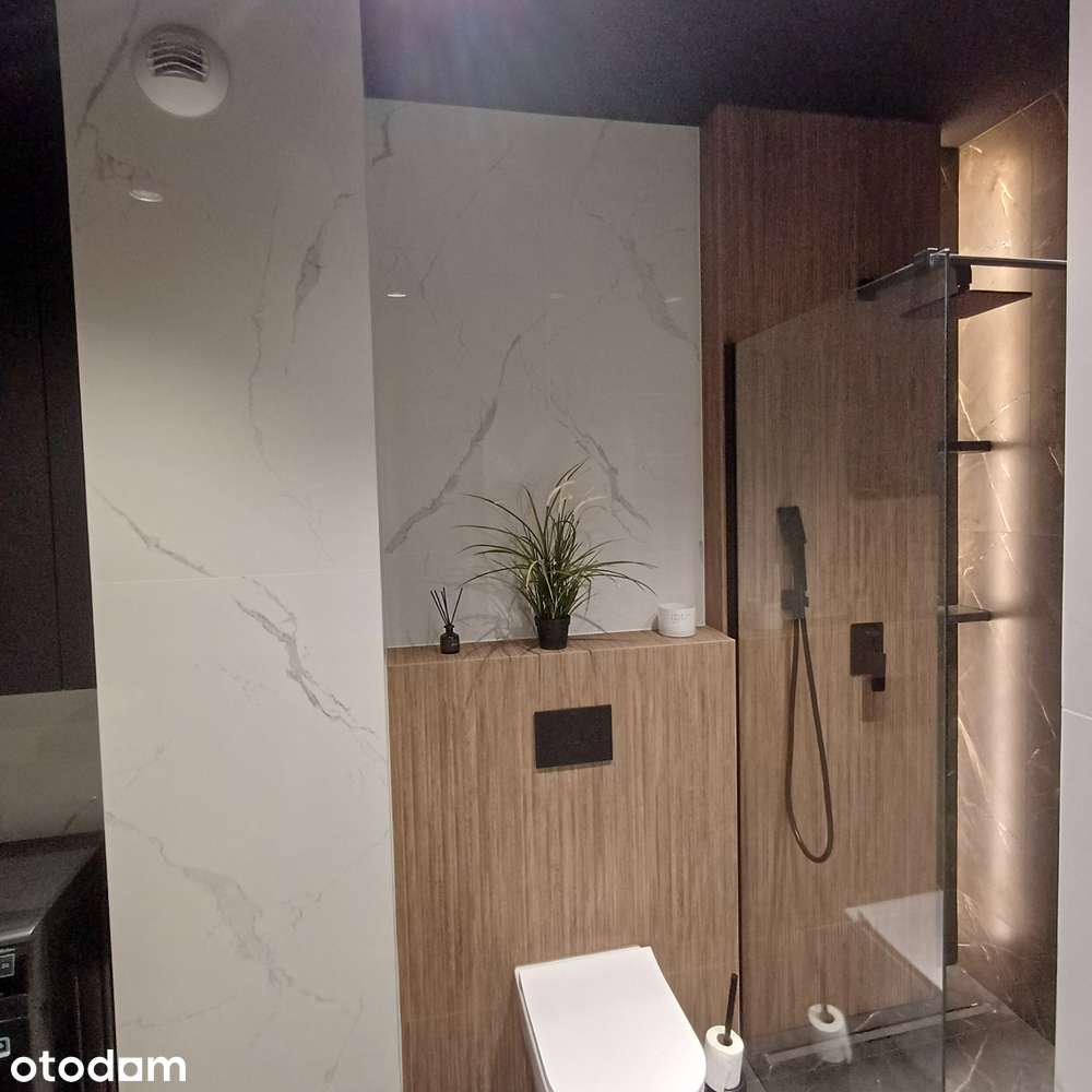 Do wynajęcia nowa, luksusowa kawalerka 30m² z balkonem i garażem.