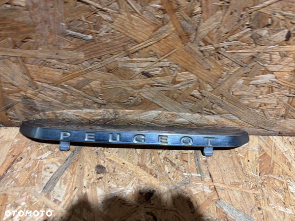 ZNACZEK EMBLEMAT PRZÓD PEUGEOT 208 9673857677