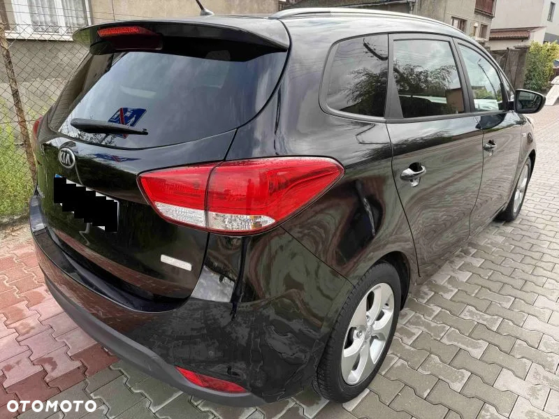 Kia Carens - 5