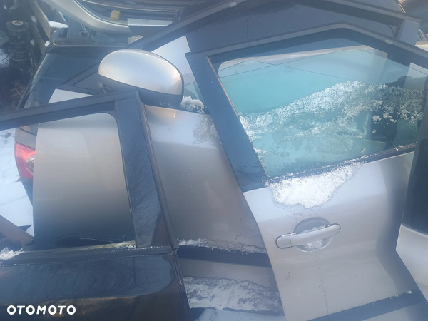 Skoda Fabia II Roomster części drzwi  maska błotnik klapa kolor 9202 lub czarny