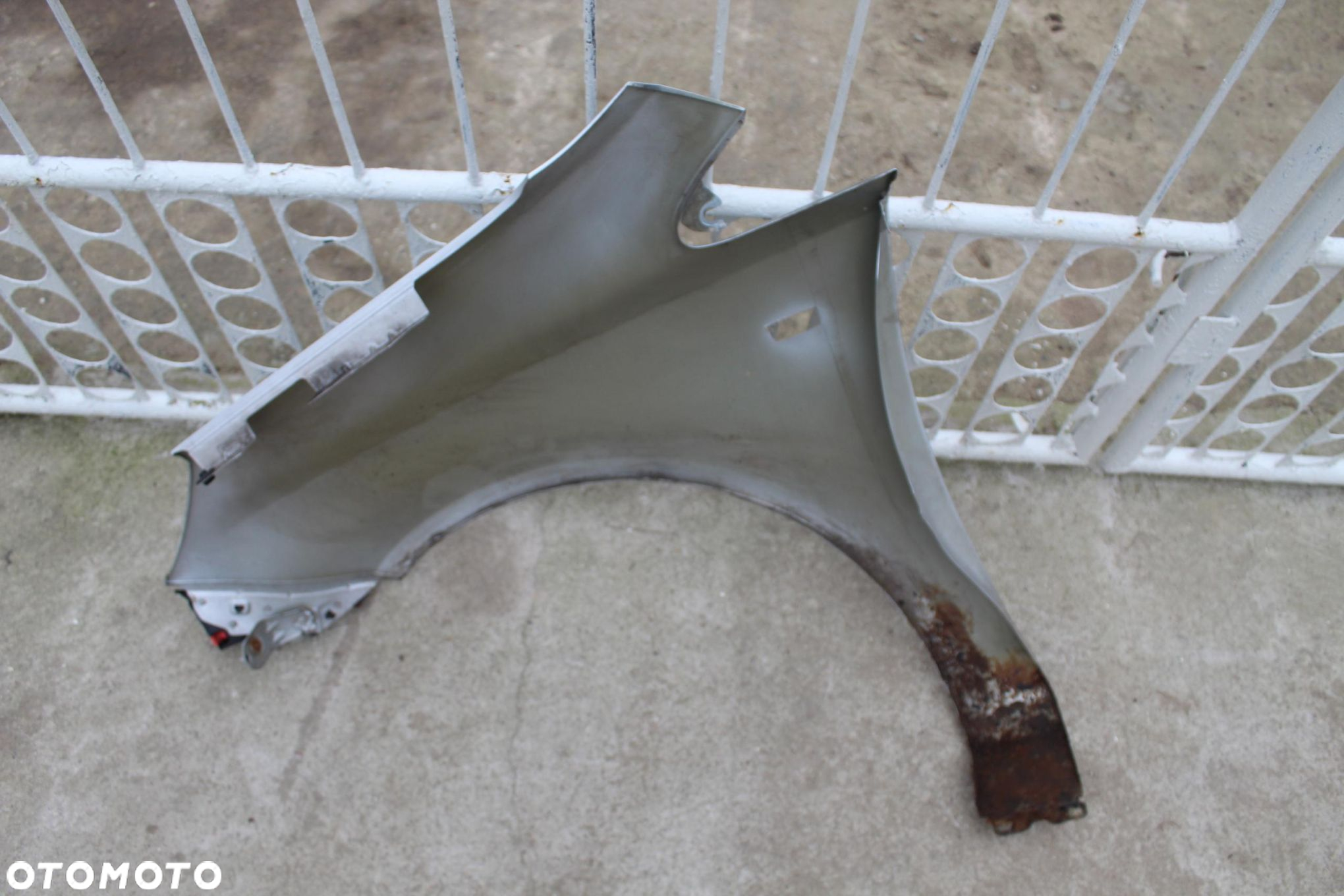 BŁOTNIK PRAWY PRZÓD Z157 OPEL CORSA D - 7