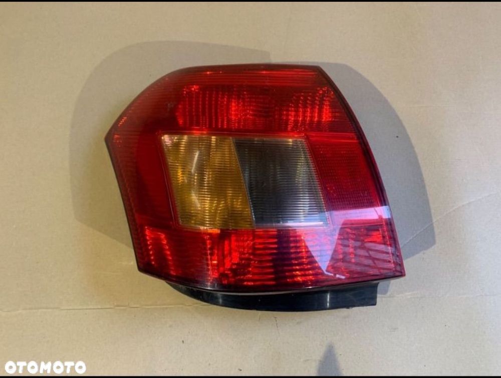 Lampa tył tylna lewa 3d HB Toyota corolla e12 - 1