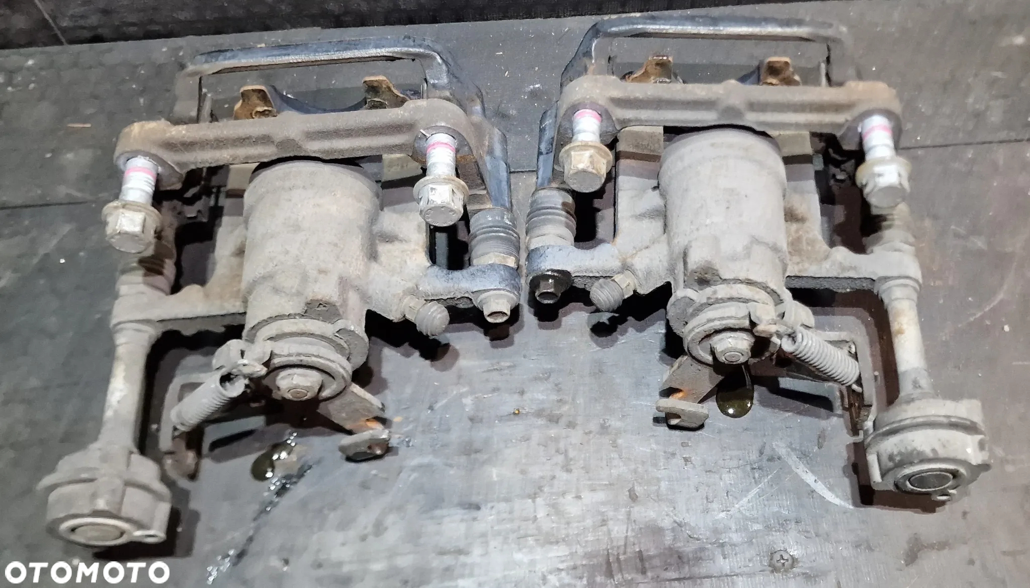 ZACISK HAMULCOWY TYŁ PRAWY LEWY 13467355 13467356 OPEL ASTRA IV J GTC OPC 1.6 T - 10