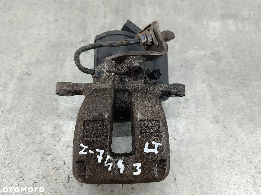ZACISK HAMULCOWY LEWY TYŁ VW PASSAT B6 32332267 TRW 1.9 TDI - 1