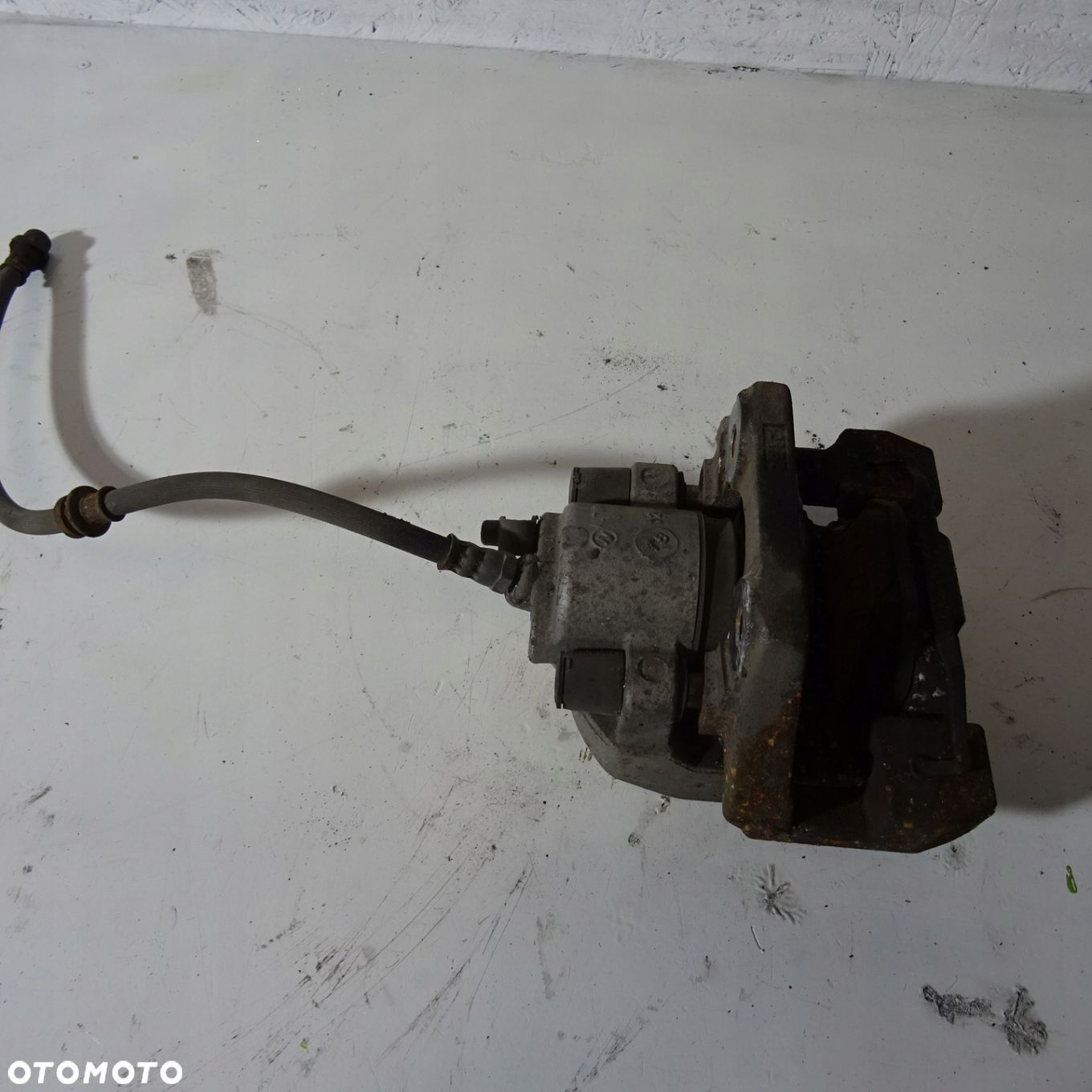 BMW X5 E70 LIFT 3.0D ZACISK HAMULCOWY TYŁ LEWY - 1