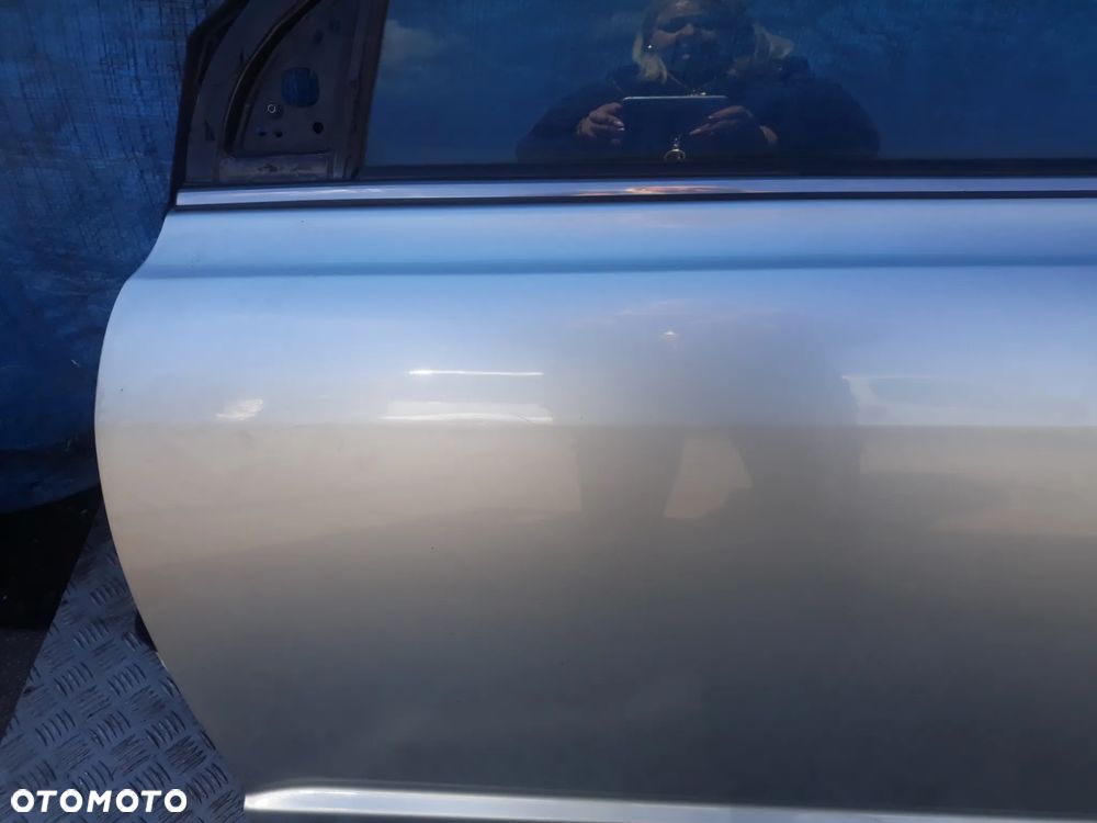 DRZWI LEWY PRZÓD TOYOTA AVENSIS II T25 LIFT 2007r  KOLOR: 1C0 - 6