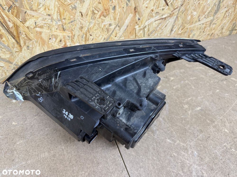 LAMPA PRAWA XENON OPEL ANTARA LIFT - 9