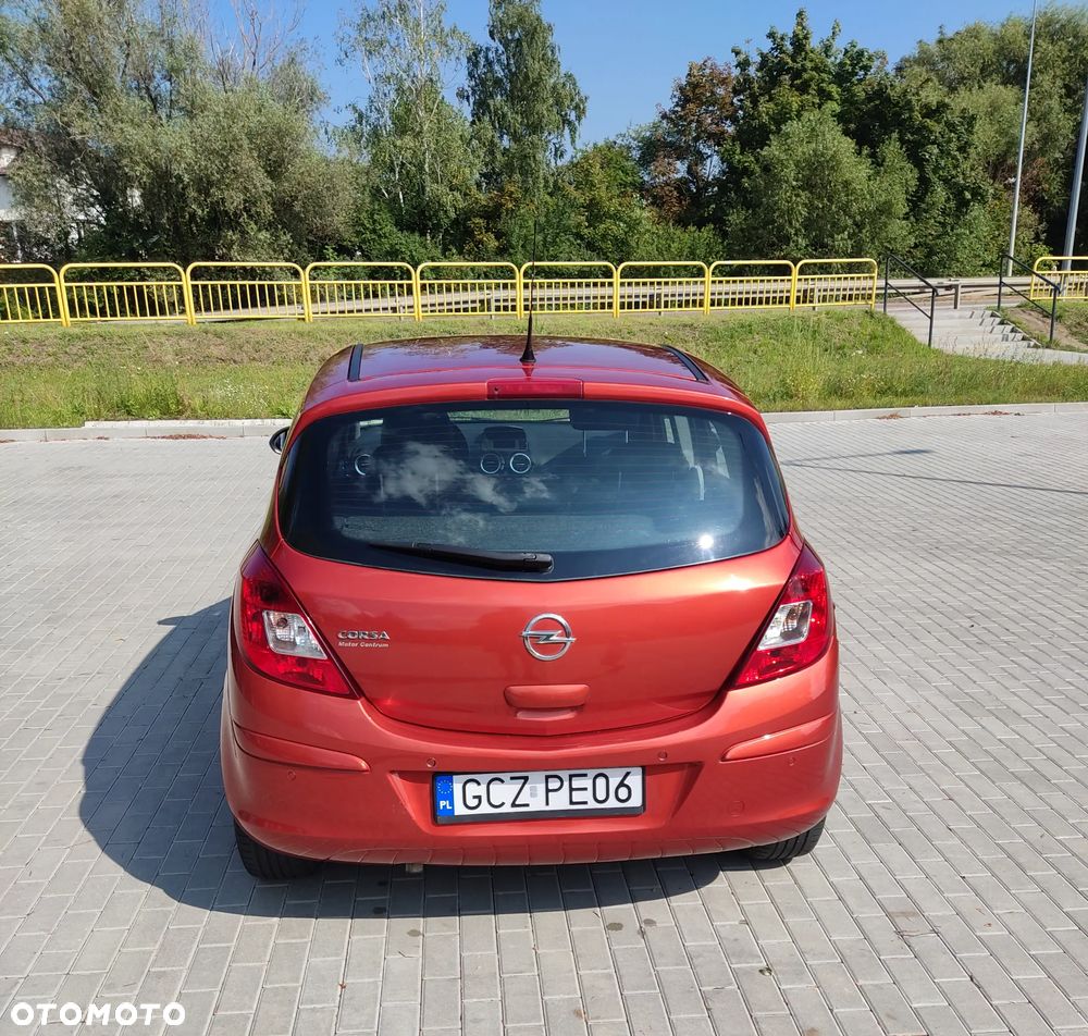 Opel Corsa 1.2 16V Cosmo - 7