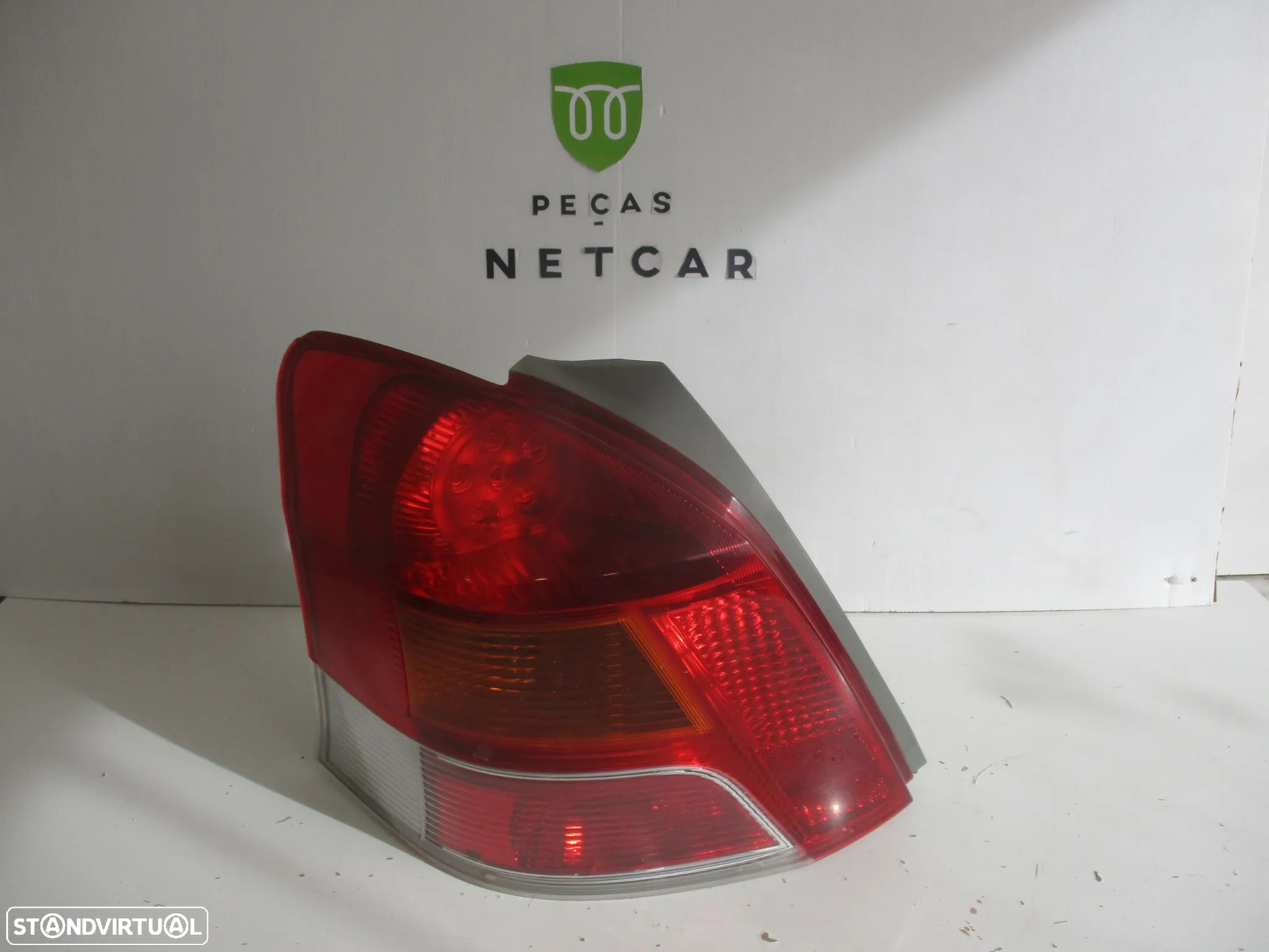 farol farolim toyota yaris 2009 - 1