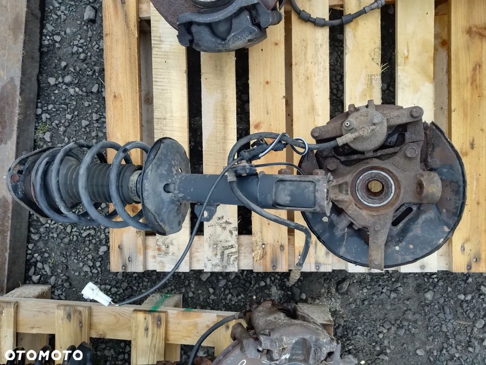 TOYOTA COROLLA E12 2.0 D-4D AMORTYZATOR ZWROTNICA PRZÓD LEWY - 2