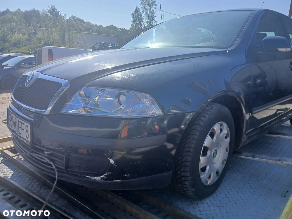 Skoda Octavia II HB 1Z1Z  maska pokrywa silnika klapa bagażnika zderzak lampa reflektor pas przedni stop lampy halogeny przeciwmgłowe odblaski grill atrapa - 10