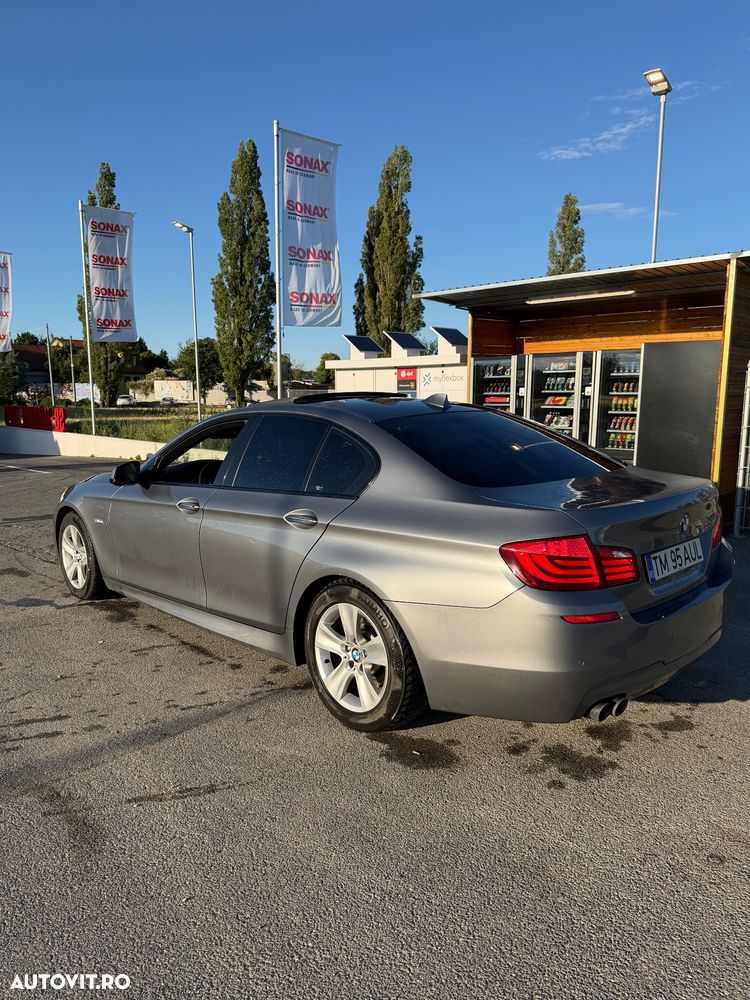 BMW Seria 5 2011 photo 4