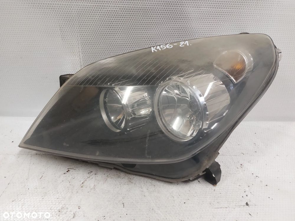 .  LAMPA PRZOD PRZEDNIA LEWA OPEL ASTRA H - 1