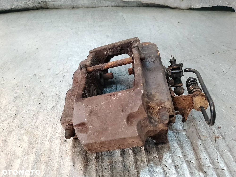 ZACISK HAMULCOWY LEWY TYŁ PORSCHE CAYENNE 3.2 V6 - 3