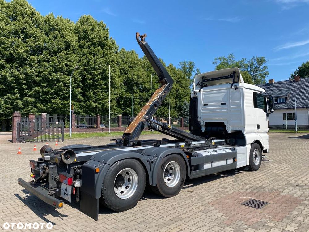 MAN 26.440 TGX hakowiec, 6x2, MEILLER, pilot, 306 t.km. - 3