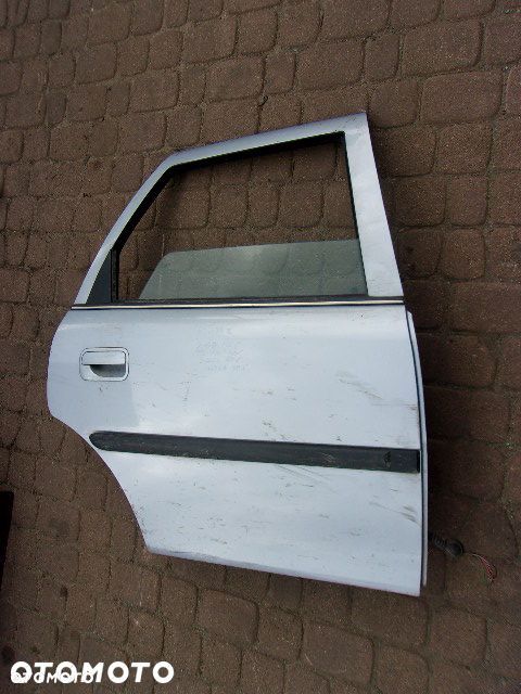 SZYBA DRZWI OPEL VECTRA B PRAWA TYLNA - 1
