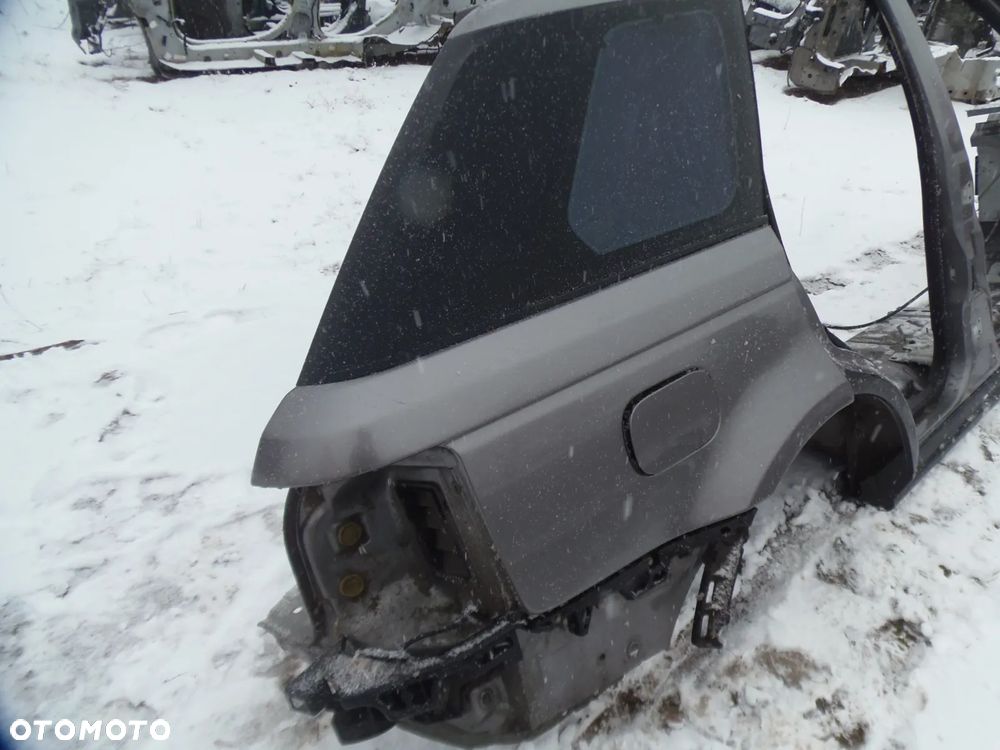 BŁOTNIK ĆWIARTKA TYŁ PRAWY RANGE ROVER SPORT L320 LIFT LRC 907 2011R - 2