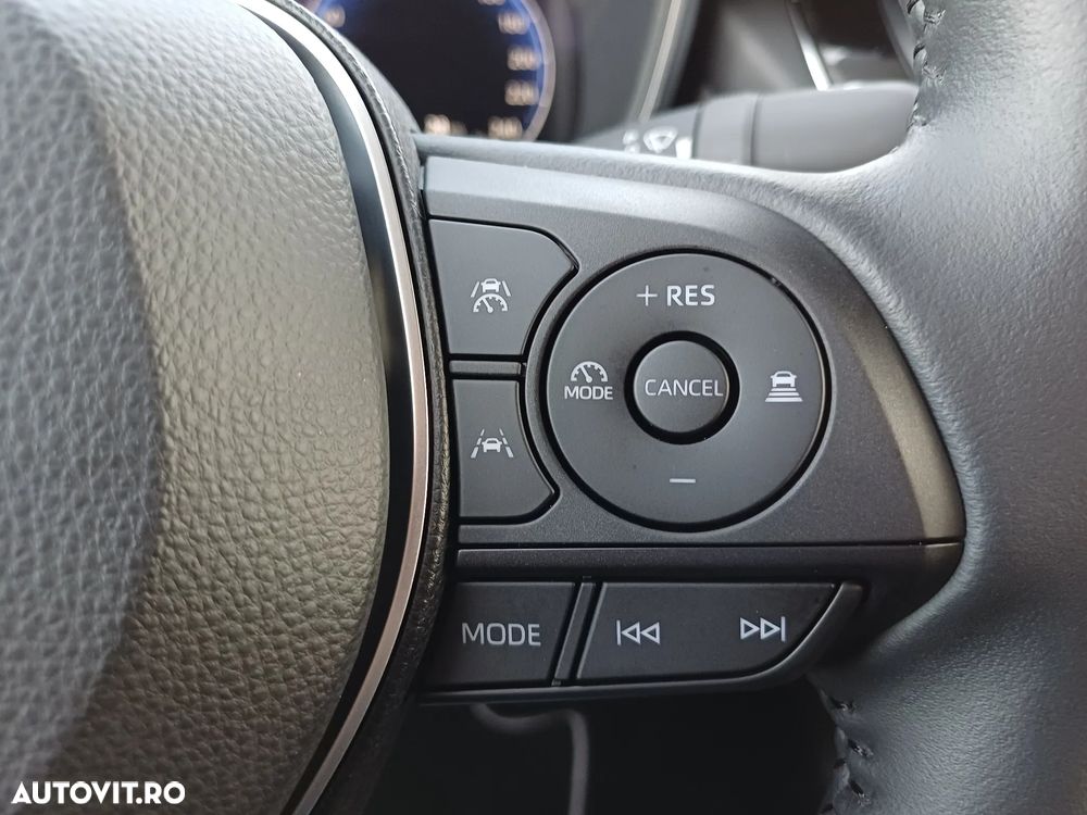 Toyota Corolla TS 1.8 HSD Exclusive - 26