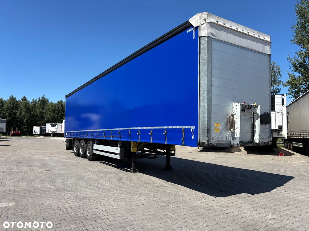 Schmitz Cargobull SCS kurtyna, podnoszona oś - 1