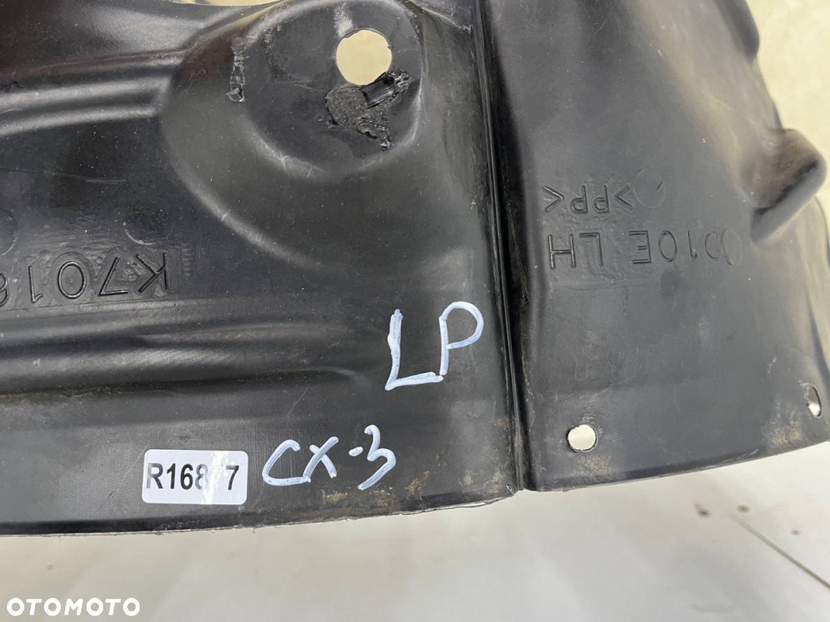 Nadkole Mazda CX-3 CX3 15-21r. LEWE przednie ORYGINALNE d10e-k7016 - 16